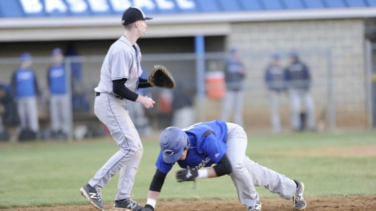 Jay Nesson fields a ball at first base