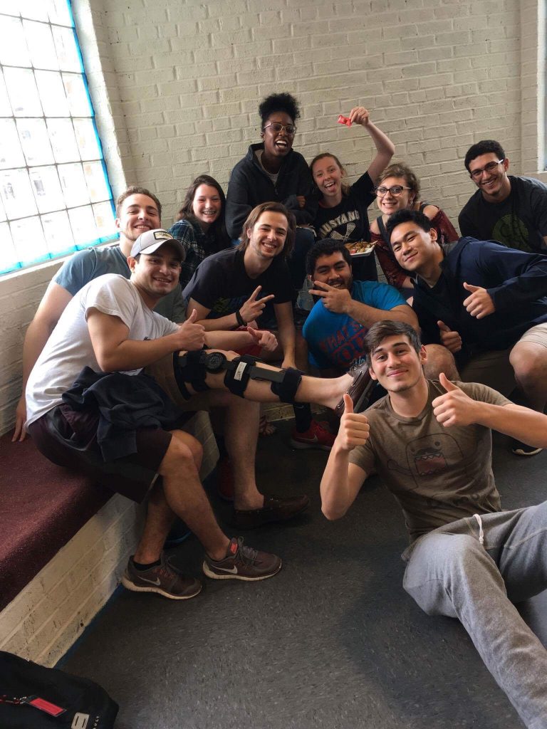 Members of the Class of 2017 pose in front of the newly-painted senior alcoves.