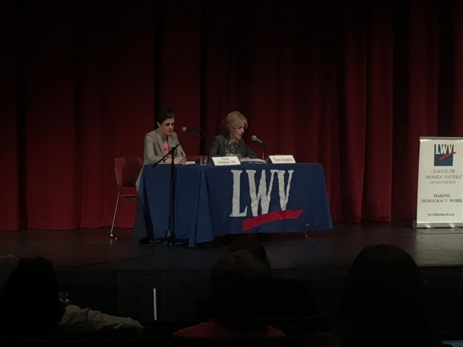 Commonwealth attorney candidates Theo Stamos (right) and Parisa Tafti (left) on stage