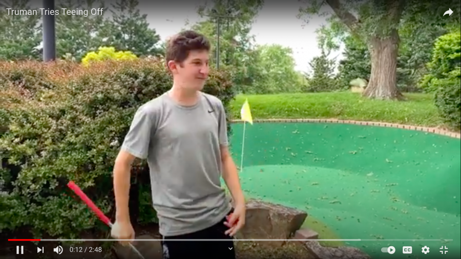 A screenshot from the embedded video where Truman attempted mini golf. It didnt go very well, but the important thing is that he tried.