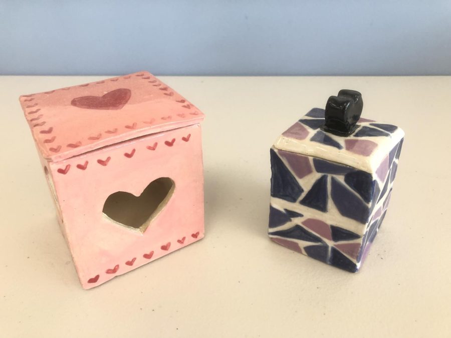 Clay boxes are designed in a heart and mosaic pattern. These projects were completed in Meridian’s ceramics class.
