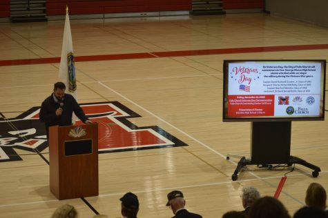 Meridian Associate Principal Dave Serensits opens the ceremony in the high school main gym. (Photo by Kylie Moffatt)