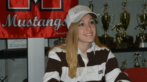 Student smiling at camera
