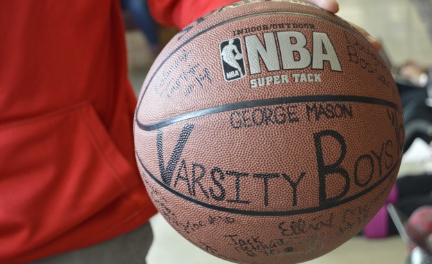 A basketball signed by all the varsity boys basketball players.