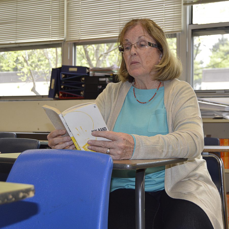Ms. Dean-Pratt reading the book “Anthem” in her spare time during lunch. (Photo by Matthew Ng)