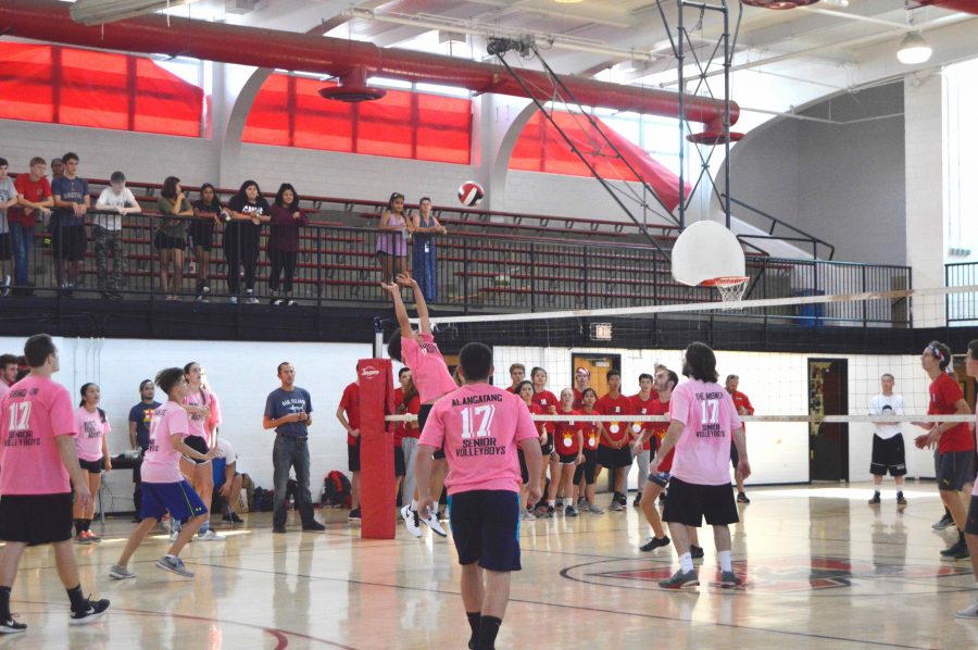 A senior jumpsetting during the volleyboys game.