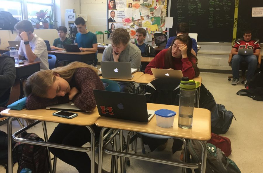 Sitting in a typical Mason class, one student is taking a short snooze. (Photo by Korinne Wills)