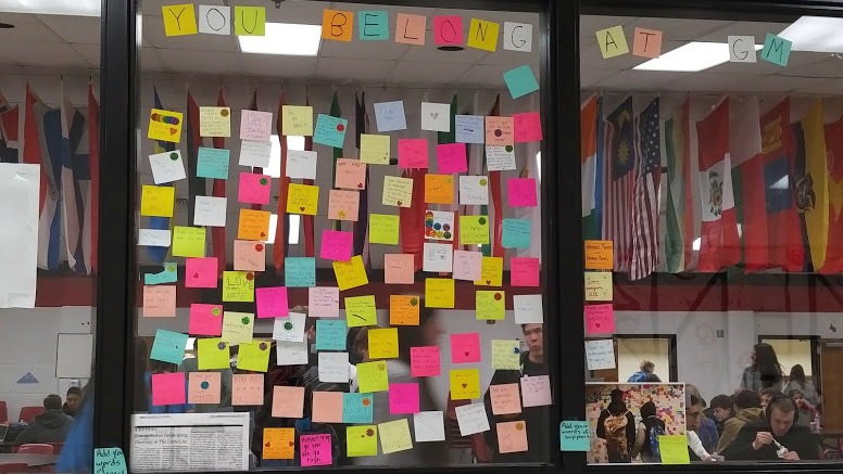 Sticky notes cover a window