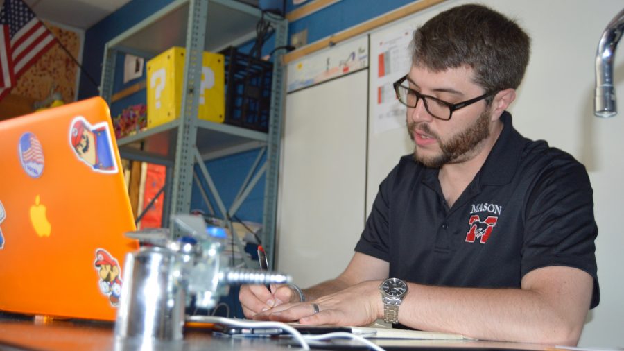 Mason physic teacher Mark Sokolowski at his desk.