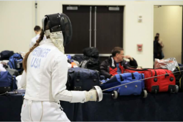  Reitinger during a fencing match at the 2017 Capital Clash. She competes in many national competitions every year, such as the Junior Olympics and the North American Cup. (Photo courtesy of the D.C. Fencer’s Club)