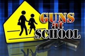 A Guns at School sign.
