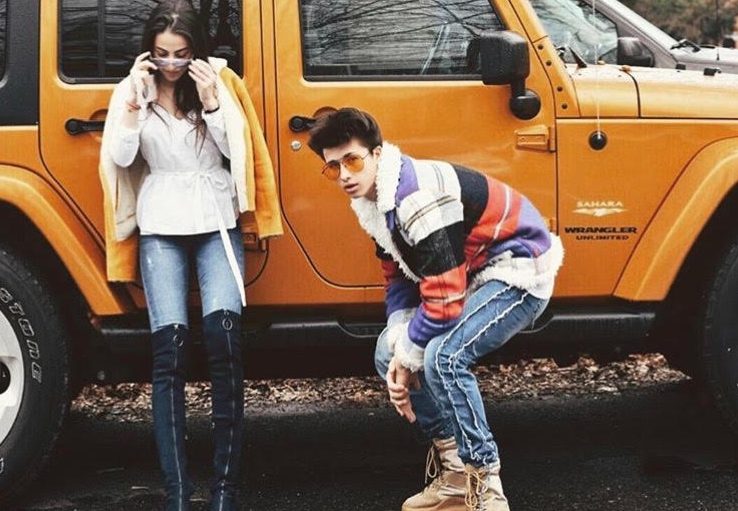 Senior Gus Abruzzi posing next to senior Nuki Giorgadze for the Best Dressed yearbook superlative. Abruzzi is famous for his ripped jeans and flashy hoodies and jackets.  (Photo courtesy of GMHS yearbook)