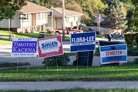 Political lawn signs in Sioux County, Iowa.