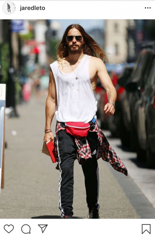 Jared Leto walks down the street wearing a fanny pack in an instagram post. 