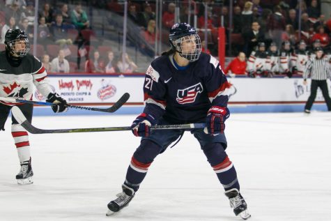 Hockey forward Hilary Knight skates during a game.