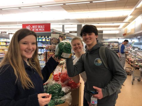 Students shop in a grocery store.
