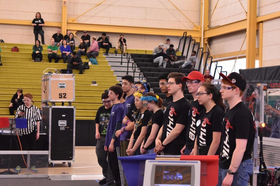 Members of the GM robotics team line up at the awards ceremony