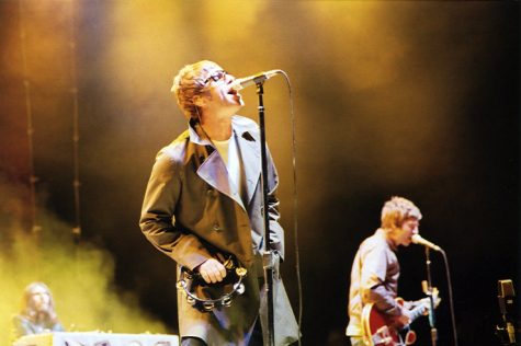 Noel and Liam Gallagher of Oasis perform live