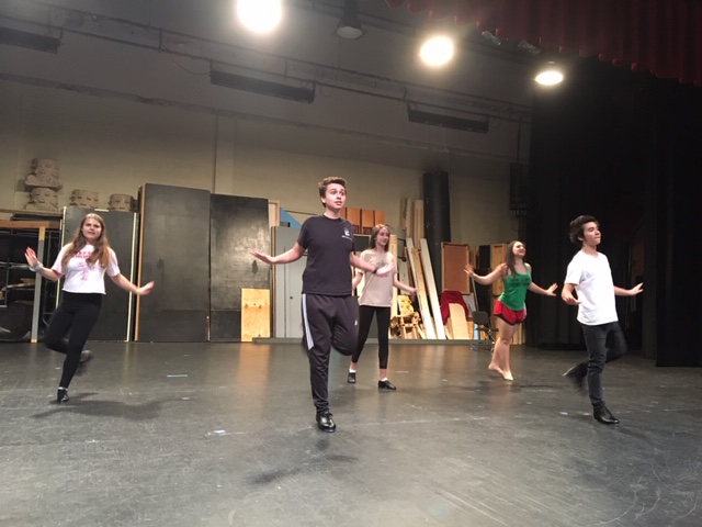 Students practicing dance for A Chorus Line