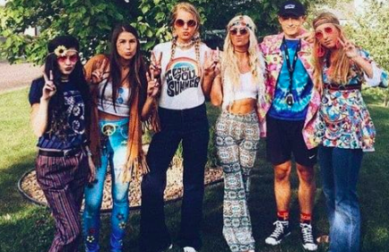 People dressed as hippies.