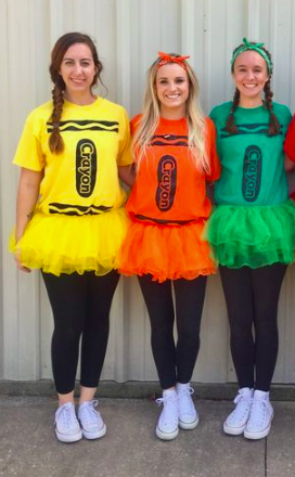 Girls dressed as crayons.