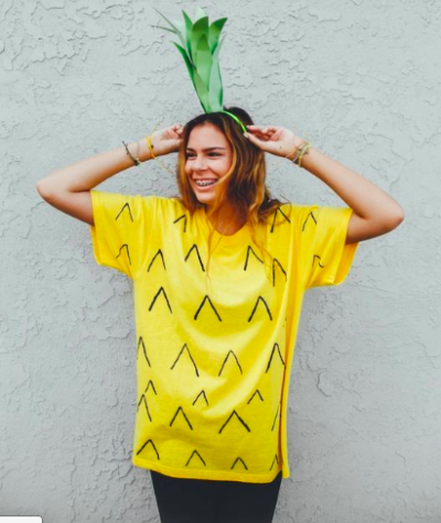 woman dressed as pineapple.