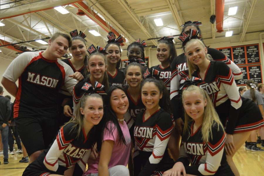 The varsity cheer team poses together in the Brentsville District High School gym. (Photo by Audrey Morrison)