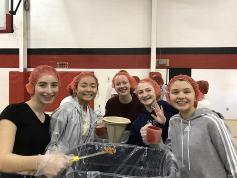 Students packing meals