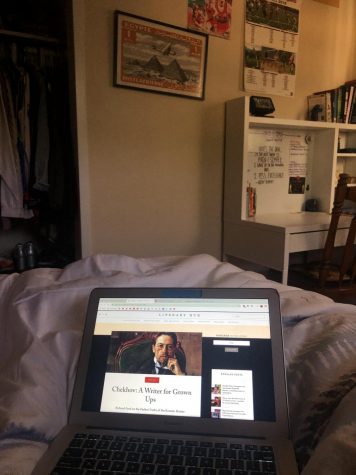 computer sits on bed