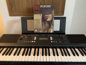 Electric piano with "Red" by Taylor swift sheet music