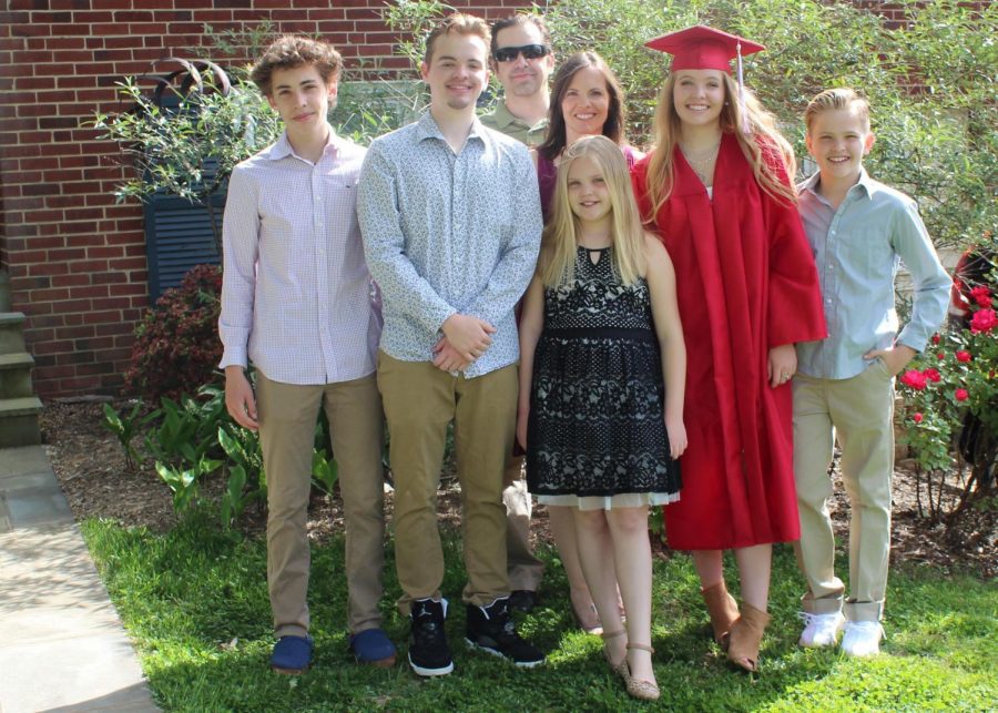 Julia Rosenberger (second from right) had to take her graduation pictures at home, along with the rest of the Class of 2020. (Photo courtesy of Julia Rosenberger)