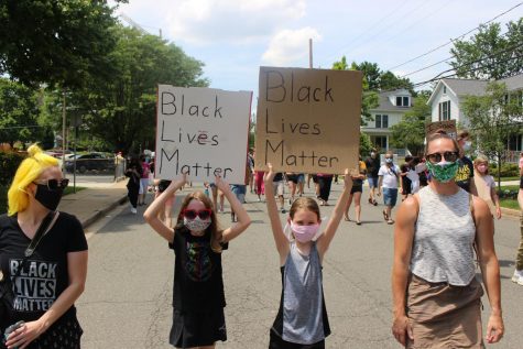 marchers with signs that say black lives matter