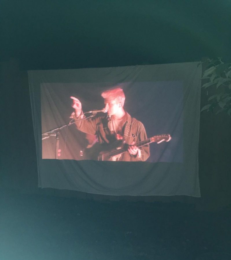 concert on a screen outside