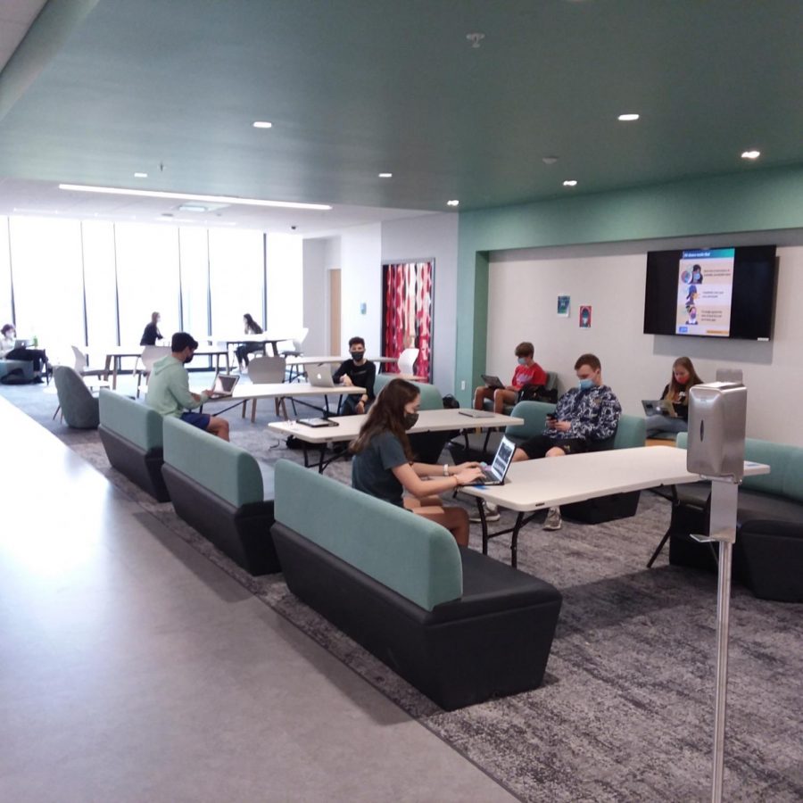 Students work in the shared learning spaces on the third floor. Upon returning to school, these spaces will be used as overflow for classes with too many students to be seated safely in the classroom. (Photo by Liam Timar-Wilcox)