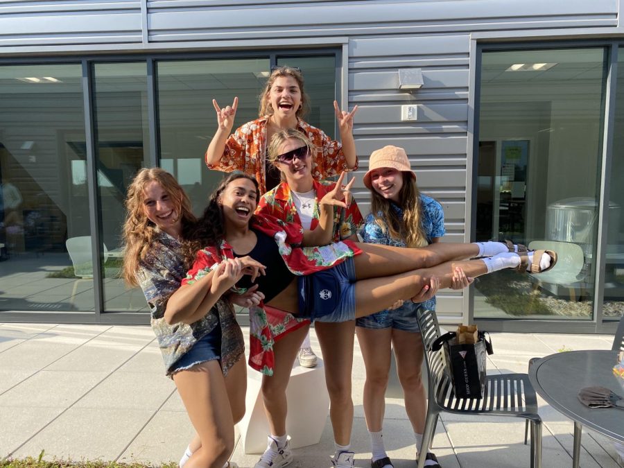 Seniors Eleanor Gieser, Sydney Longer, Bee Doss, Abbey Meighan, and Coral Rankin show their excitement for spirit week.