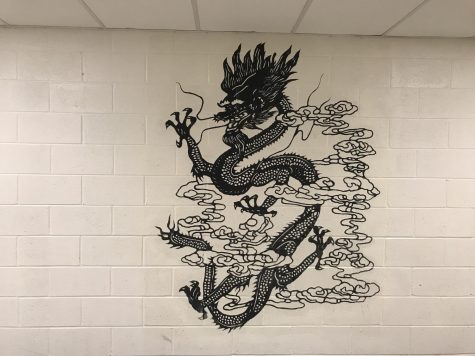 An intricately painted dragon done by a student artist.