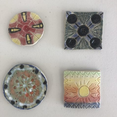 Examples of relief sculptures done by the students of the ceramics class.