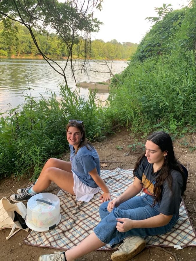 Juniors Isabel Costa and Tucker Ward on a picnic.