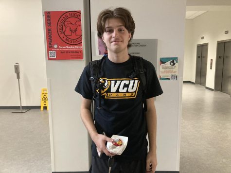 Will Atkeson poses in a VCU Rams t-shirt.