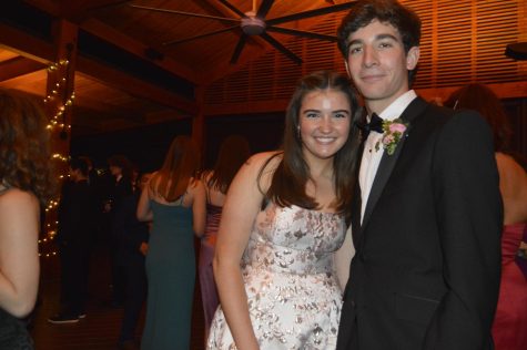 Junior Will Jacobson poses for a photo with his date.