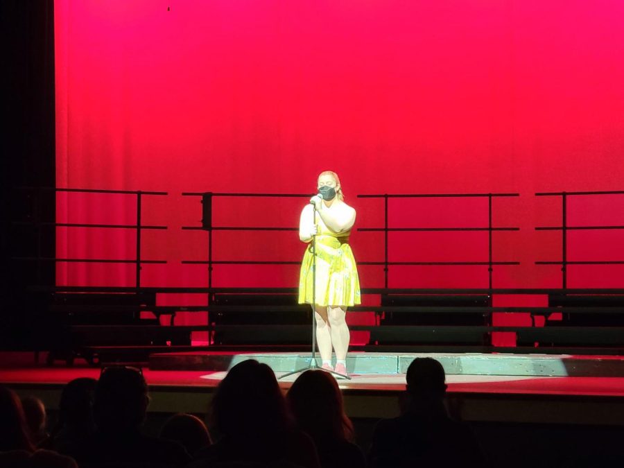 Theisz performs her solo of “How Bout A Dance” from the “Bonnie and Clyde” musical, at the Meridian Choir’s Broadway Desserts Concert.