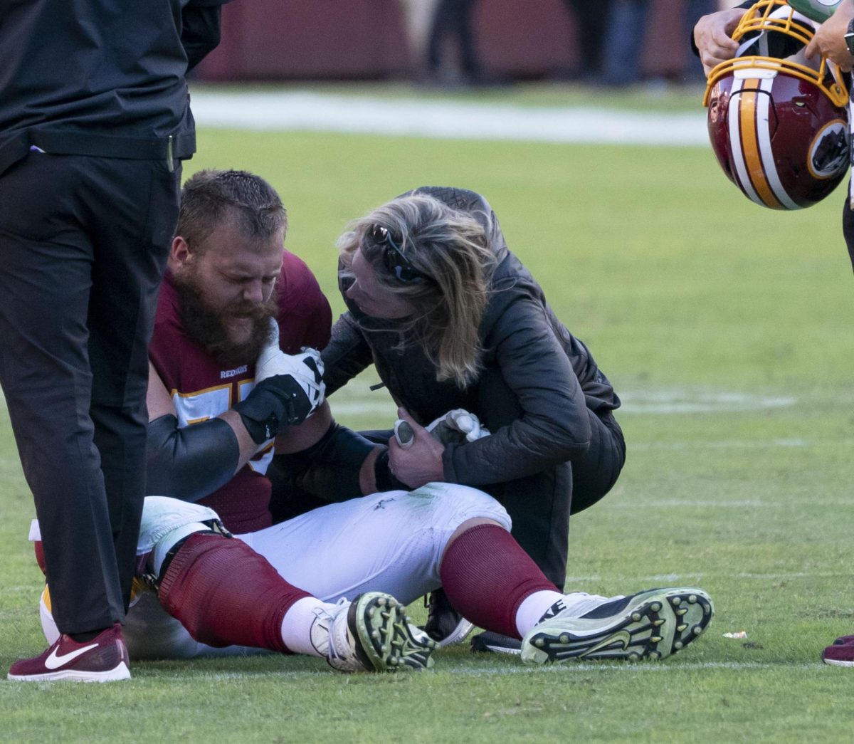 Washington Redskins Offensive Lineman Brandon Scherff suffers an injury at FedEx Field (photo via Wikimedia Commons).