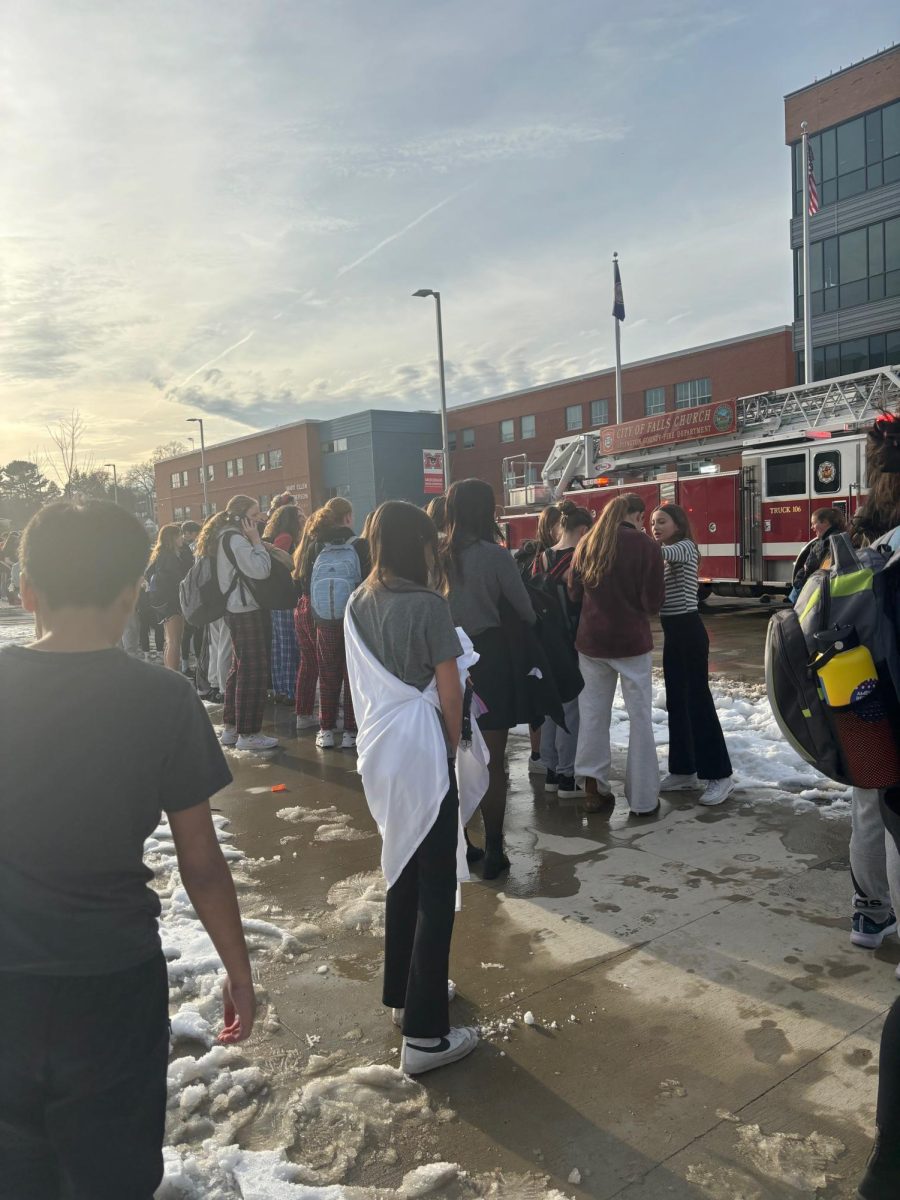 Students+gather+outside+Meridian+High+School+as+emergency+responders+investigate+the+building.+%28Photo+by+Abby+Crespin%29