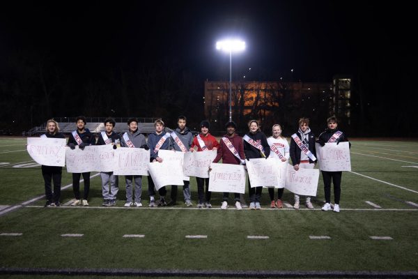  From right to left: Dmitry Oleynik, Joseph Ziayee, Jackson Funk, Pawanart Songsiriarcha (Fawn), Carter Williams, David Ting, Campbell Michael, Jonathan Gideon, Kaylah Curley, Katherine Anderson, Tucker Albaugh, and Alistair Way stand side by side for Senior Night (Photo courtesy of Lucas Hollinger).
