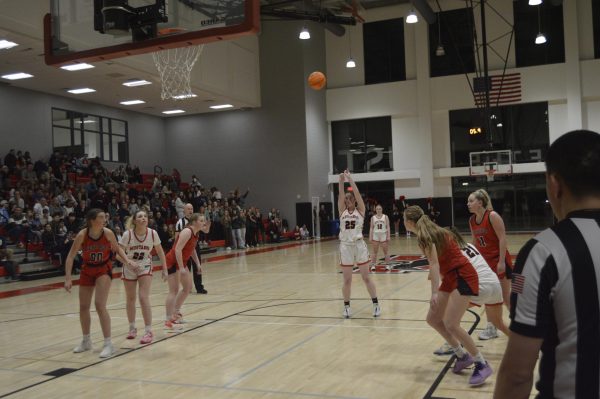 Senior Maureen Tremblay (23) hits a free throw to put the Mustangs up by two (Photo by Ben Mossburg)