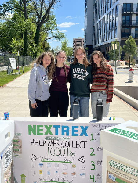 (L-R) Seniors Ruby Jones, Piper Cannon, Kyra Gorman, and Julia Hall run a stand on NexTrex, an organization that helps to recycle plastic bags and film that usually cannot be recycled. (Photo by Anna Goldenberg)