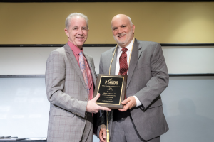 Dr.DeFazio receives the 2024 Online Teaching Excellence Award by George Mason University for his excellent commitment to teaching online classes. (Photo courtesy of Dr. DeFazio)