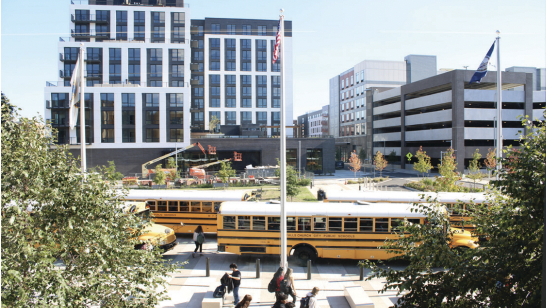 Students leave Meridian for the weekend. The West End project rests in the background. (Photo by Molly Moore)