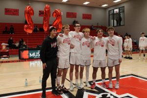 Five seniors and the team manager pose for a photo. (Photo by Monroe Duff)