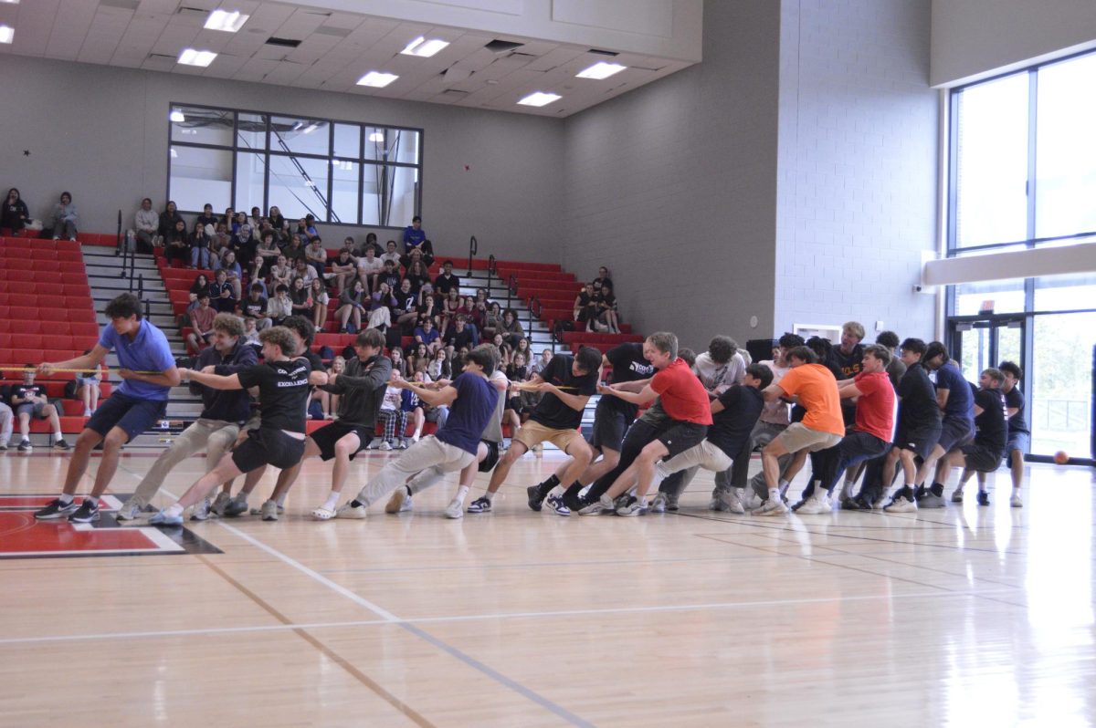  Seniors pull the weight in the infamous game of tug-of-war, winning every round. (Photo by Tessa Kassoff)